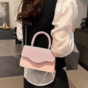 Pink sequin crossbody bag for women with sparkling rhinestones and silver chain strap