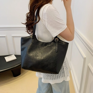 Retro black faux leather tote bag with large capacity for commuting and daily wear