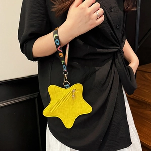 Star-shaped yellow crossbody bag with litchi texture leather and LOVE webbing handle