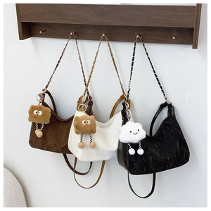 Three pleated texture crescent tote bags in coffee, cream and black with chain straps