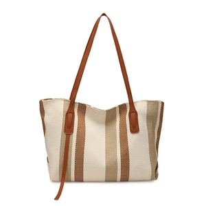 Vertical striped canvas tote bag in off-white and brown with leather straps