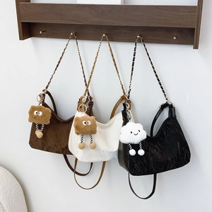 Minimalist wrinkled leather half moon underarm bags with plush charms and chain straps