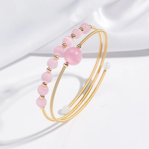 Pink crystal beaded wrap bracelet with gold wire minimalist multi-layer spiral design