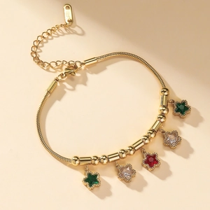 Bracelet étoile doré avec strass colorés sur une chaîne serpent en acier inoxydable