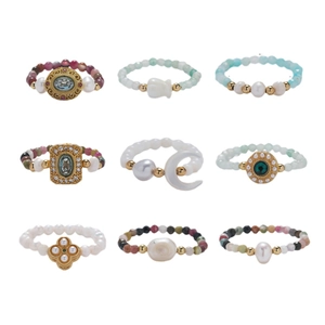Set of nine boho beaded rings with freshwater pearls and colorful gemstones charms
