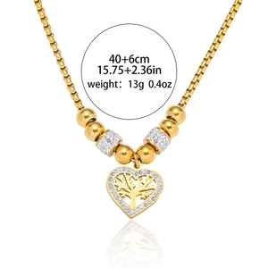 Golden heart tree of life necklace with pavé zircon crystals and beaded chain details