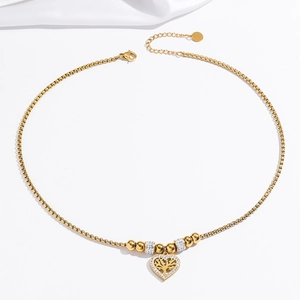 Golden stainless steel necklace featuring a crystal heart tree of life pendant on box chain