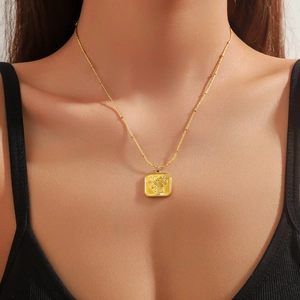 Elegant gold square pendant necklace with embossed rose flower on a chic ball chain