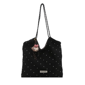 Black canvas polka dot tote bag with floral print and bear pendant for summer