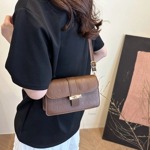 Brown crocodile pattern faux leather shoulder bag with elegant bamboo metal buckle clasp