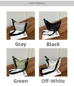 Detail showing multi-color fabric dumpling bags in gray black green and white colors