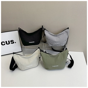 Four colors of nylon dumpling crossbody bags in black, grey, beige, and army green