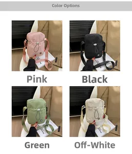 Detail showing pink, black, green and off-white small nylon crossbody bags with zip closure
