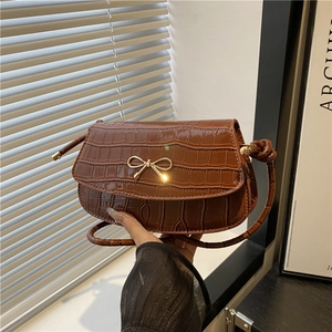 Brown crocodile pattern square shoulder bag with golden bow hardware for women