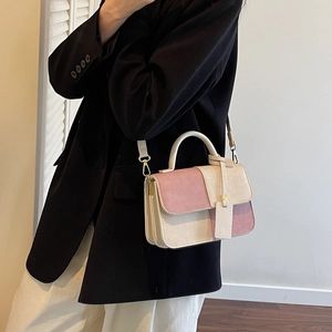 Pink and beige woven plaid mini handbag with top handle and crossbody strap