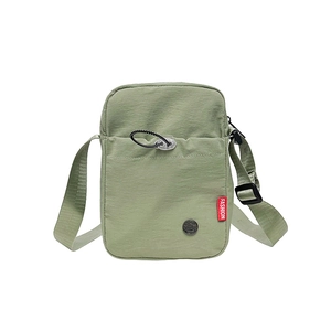 Light green nylon crossbody bag with drawstring pocket and adjustable strap for sports