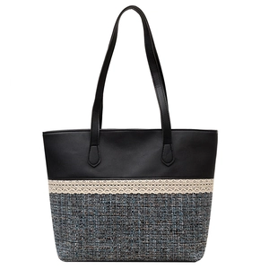Large capacity tote bag with black faux leather and woven ethnic pattern for summer
