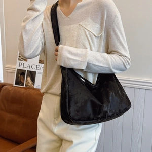 Fashionable black hobo bag with glossy velvet texture and semi-moon shape for women