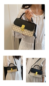 Detail of monogram print crossbody bag with leather flap and gold-tone turn-lock closure