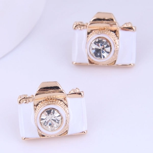 Minimalist gold camera stud earrings with white enamel and sparkling crystal accents