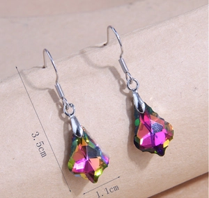 Detail showing colorful maple leaf crystal earrings with dimensions of 3.5cm by 1.1cm