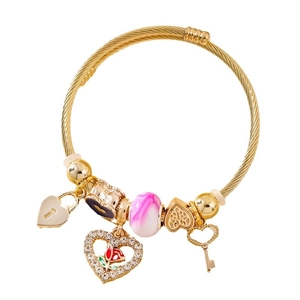 Elegant gold braided bracelet with heart-shaped charms and floral details on white background