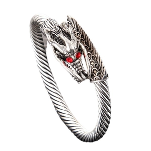 Retro dragon head cuff bracelet in antique silver finish with red stone eyes
