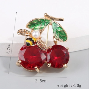 Elegant cherry bee brooch with red gems and green enamel leaves for women's suits