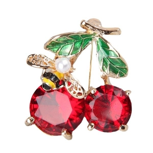 Elegant cherry and bee brooch with red crystals, green enamel leaves and pearl detail