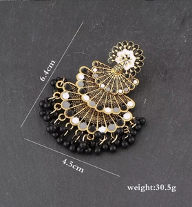 Detailed view of bohemian layered fan earrings with dimensions 6.4cm x 4.5cm and 30.5g weight