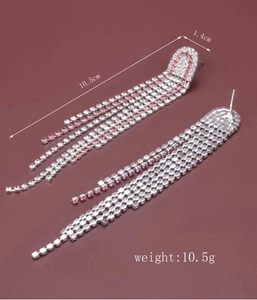 Detail view of long tassel earrings with pink and white rhinestones and dimensions