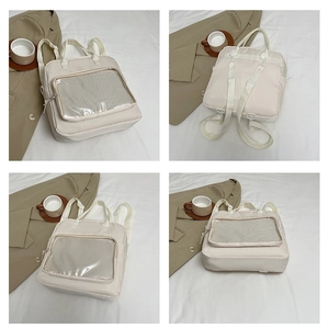 Detail view of cream-colored nylon pain bag with transparent PVC window for display