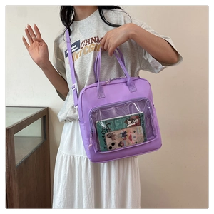 Detail of purple waterproof nylon bag featuring a transparent PVC display window and straps