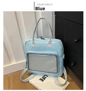 Detailed view of a blue multi-functional nylon backpack with grey mesh zipper pocket