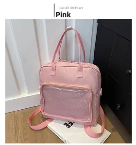 Detailed view of the pink multifunctional backpack with mesh pocket and dual straps