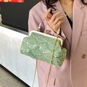 Elegant green sequin frame bag with floral handle and gold chain strap for women