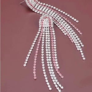 Elegant silver tassel earrings featuring pink and clear rhinestones for festive parties