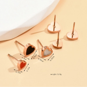 Detail view of heart stud earrings in rose gold with dimensions and product weight labels