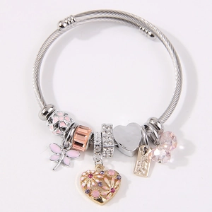 Silver twisted open bangle with pink enamel butterfly, crystal beads, and heart charms