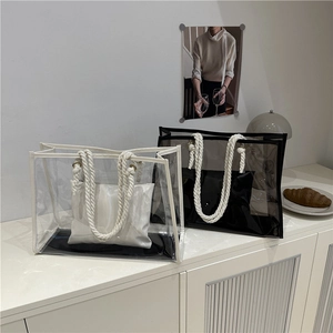 Minimalist transparent PVC tote bag with thick cotton rope handles and inner pouch
