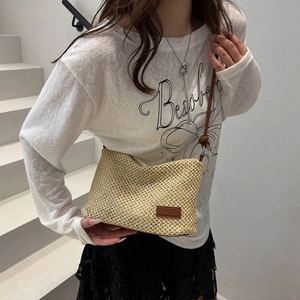 Chic hollow out straw woven tote bag with brown leather straps for summer beach holidays