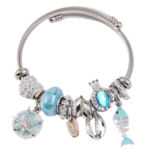 Silver bead bracelet with blue charms, starfish and shell pendants on steel wire