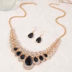 Baroque style jewelry set with black teardrop gemstones and necklace and earrings