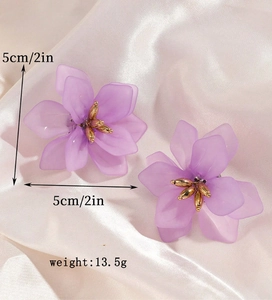 Close-up of purple flower earrings with 5cm size and 13.5g weight specifications