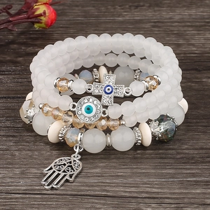 Bohemian multi-layer stretch bracelet set with Evil Eye and Hamsa Hand charms