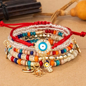 Bohemian multi-layer beaded bracelet set with Hamsa hand and Evil Eye charms