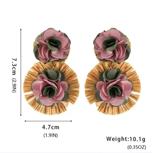 Detailed view showing dimensions of pink floral and raffia earrings, 7.3cm long