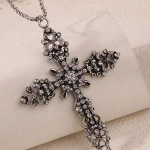 Vintage oversized silver cross necklace with sparkling rhinestones on baroque metal chain