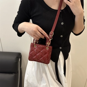 Deep red quilted patent leather mini handbag for women with golden hardware and shoulder strap