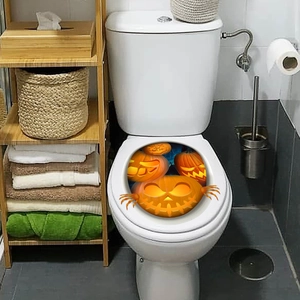 Dettaglio degli adesivi 3D di zucca di Halloween con facce arancioni e artigli spaventosi